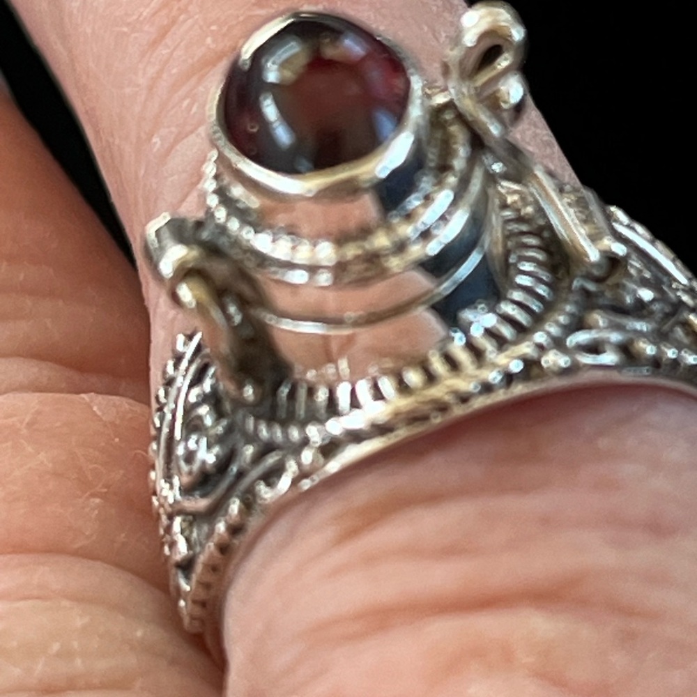 Natural cabachon garnet in antique style poison ring